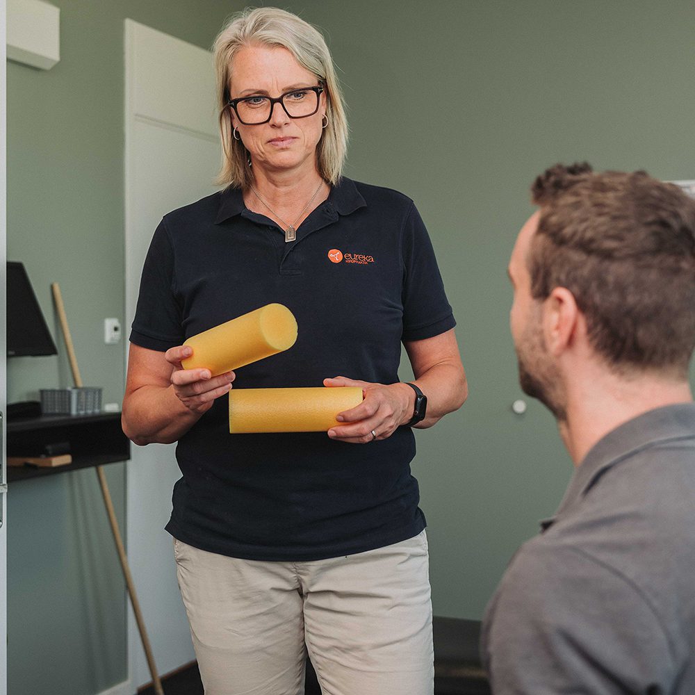 Therapist showing tools they use for treatments